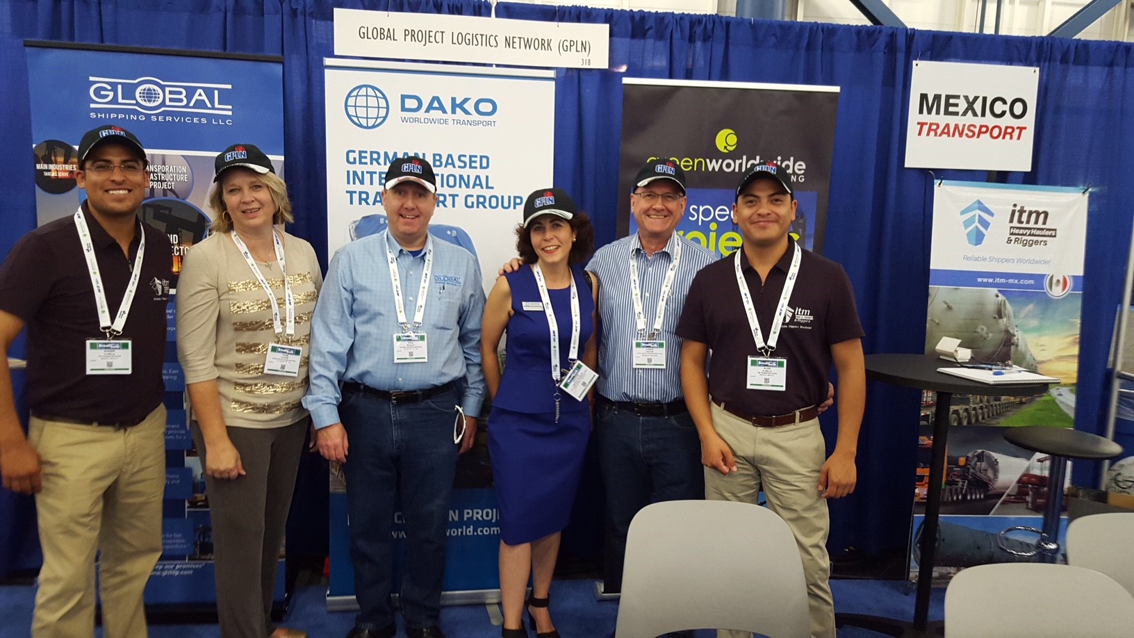 group of Global Shipping employees at a conference